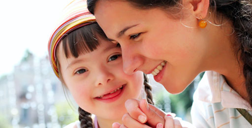 A paid parental caregiver in Aurora, CO with her daughter who has Down Syndrome.